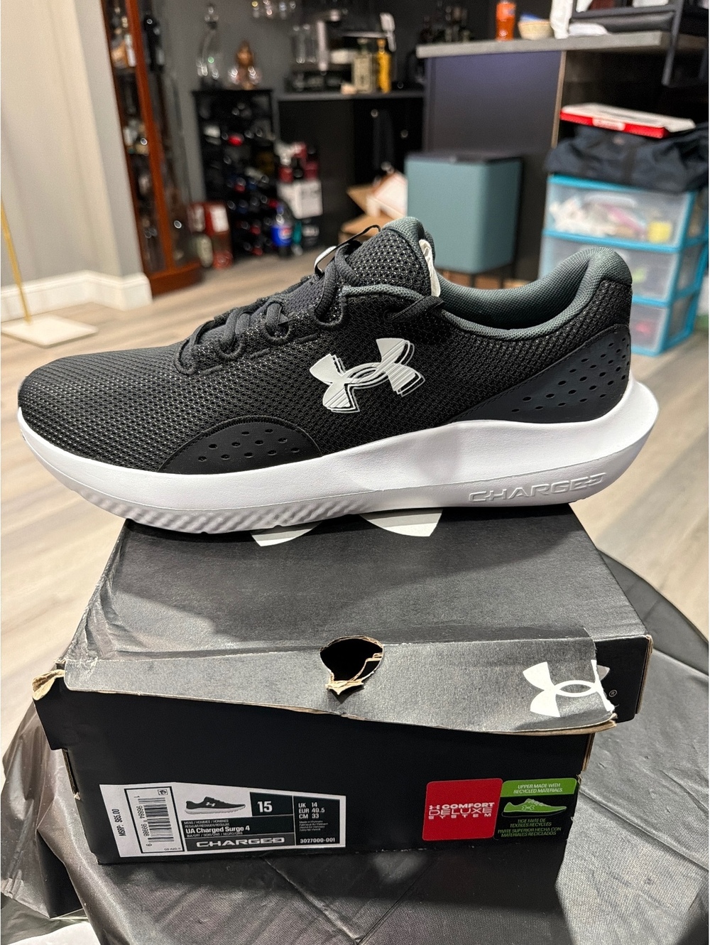 Under Armour Charged Surge 4 shoes, the box says U.S. men’s 15